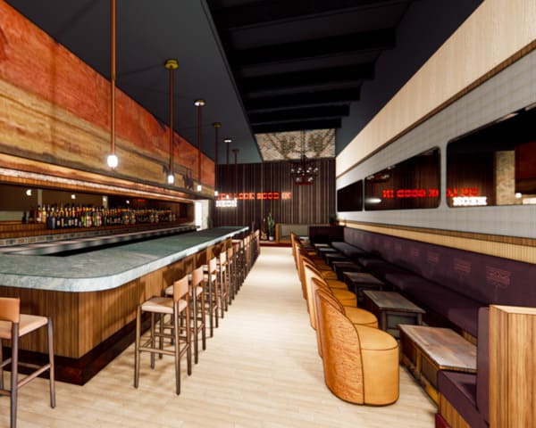 Modern bar interior with green stone countertop, wooden barstools, and neon sign reading “YOU LOOK GOOD IN NEON.”