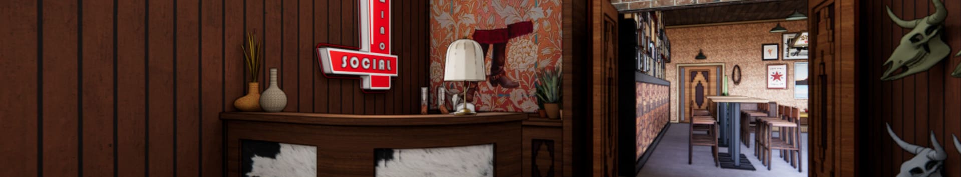 Interior of Palomino Social featuring a vintage Western mural, dark wood-paneled walls, cowhide-clad reception desk, and hanging pendant lights.
