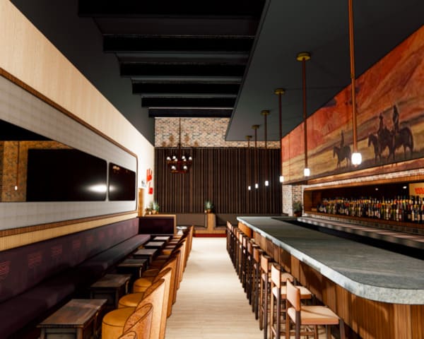 Wide-angle interior view of a Western-themed bar with a long stone countertop, leather barstools, and a backlit liquor display beneath a mural of cowboys on horseback.